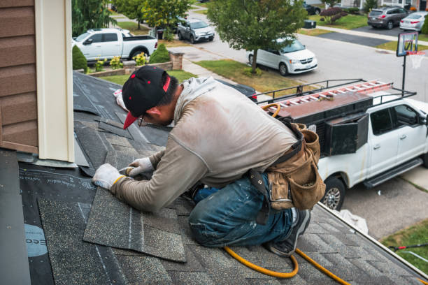 Professional Roofing technician working in Waterford, CT